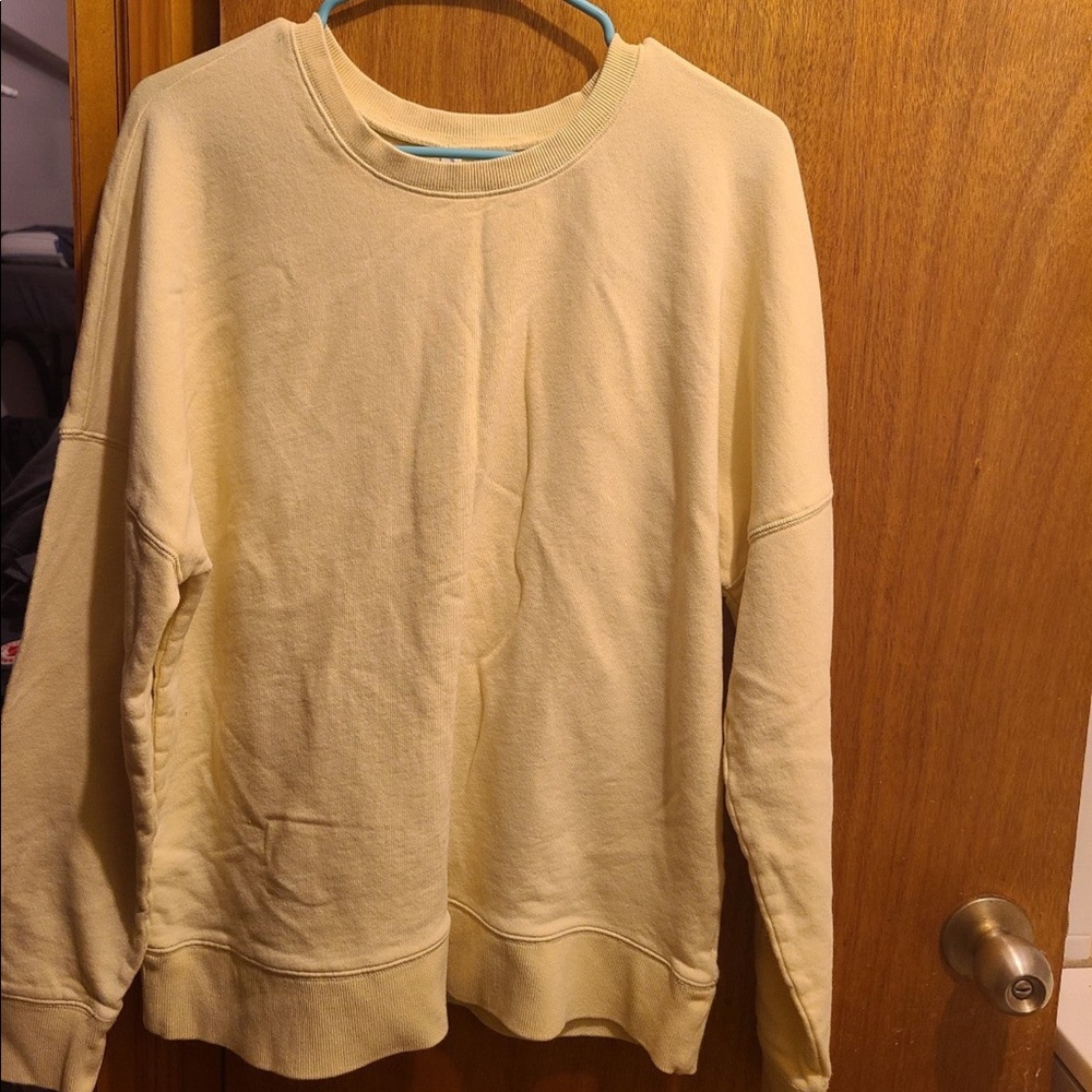 Pastel yellow Fabletics crewneck sweater size large